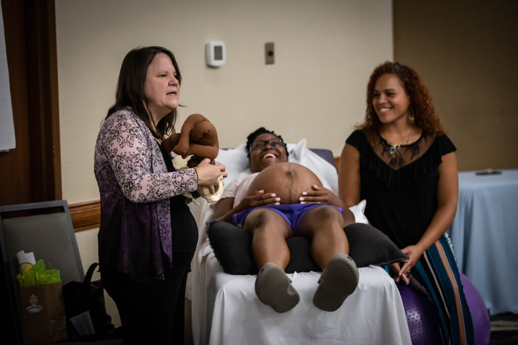 Gail teaching with Ciarra and Melissa Mitchell. Photo by Kristin Tangen